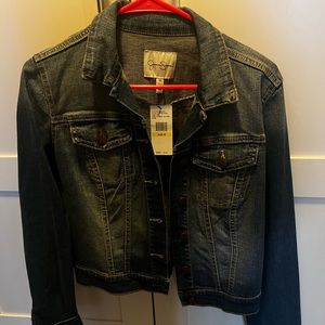 Denim jacket. Woman’s size M. Brand new.